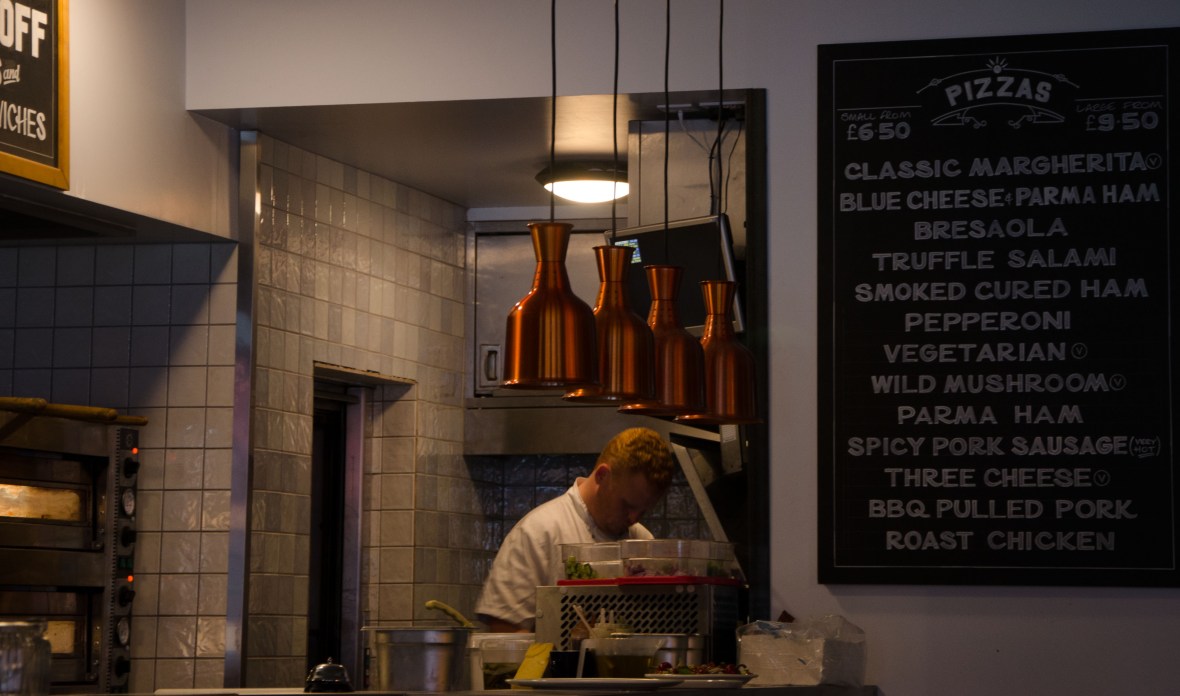 Wood fired pizzas being made